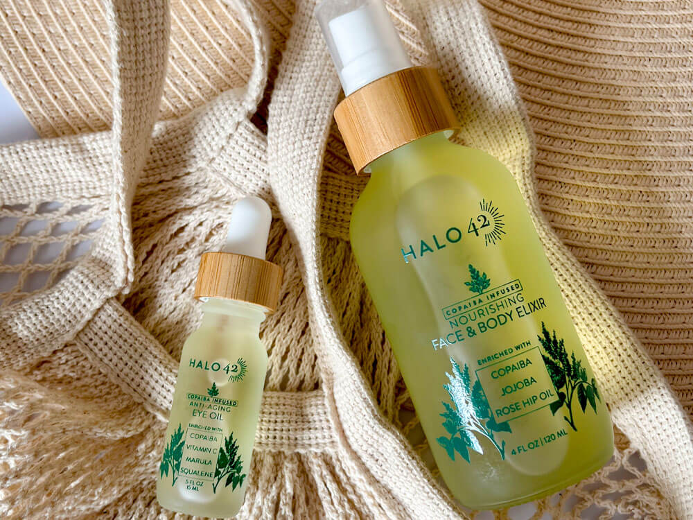 Halo42 skincare anti-aging eye oil and body elixir in a beige bag