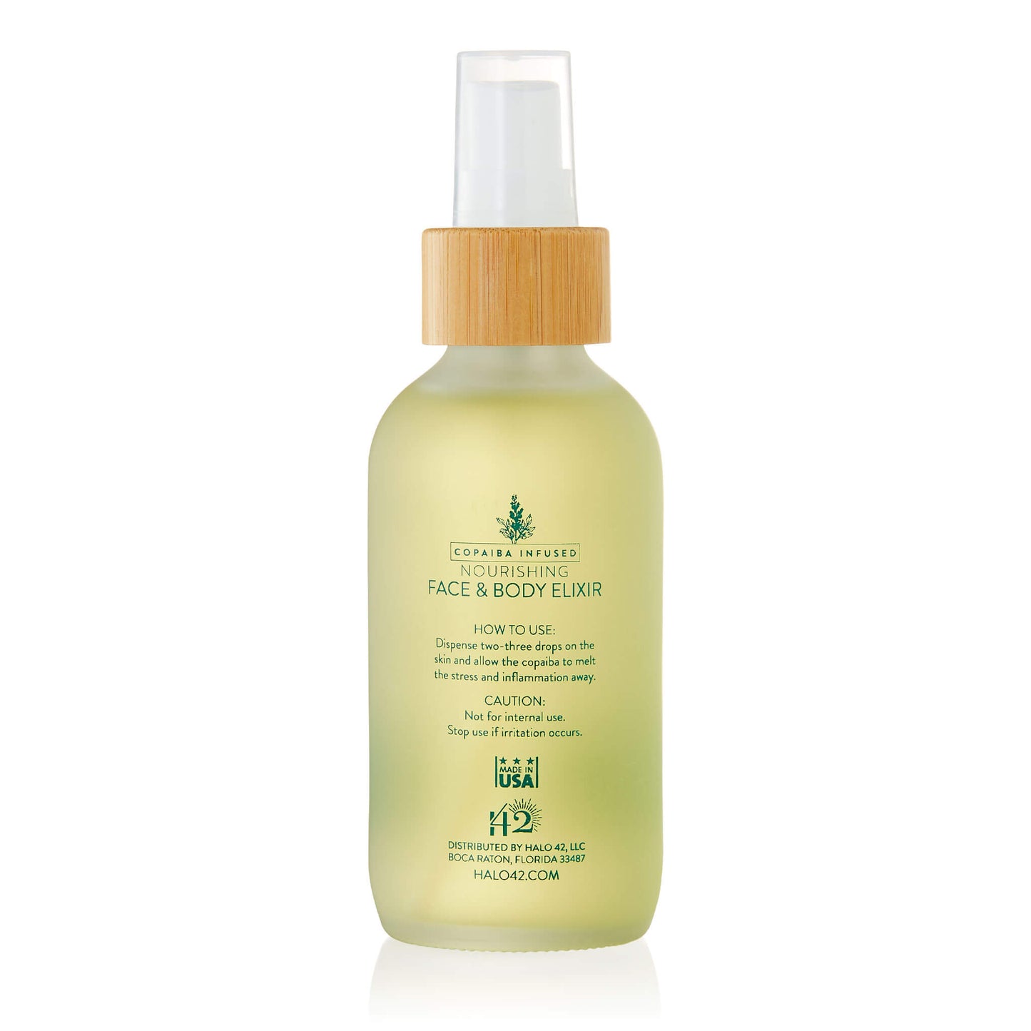 Halo42 Copaiba infused face and body elixir back of bottle