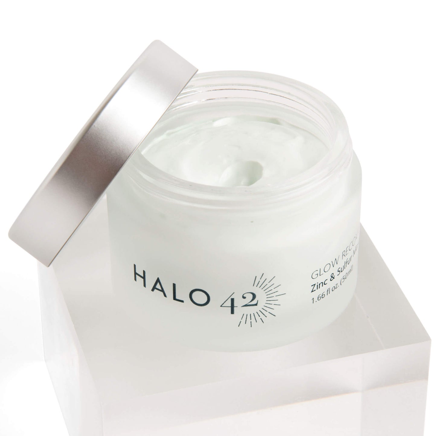 
                  
                    Halo42 skincare zinc and sulfur mask bottle open showing product
                  
                